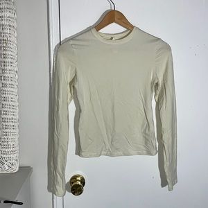 Skims cotton jersey long sleeve t-shirt, color bone, size medium